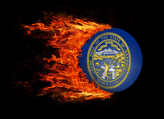 Image showing US state flag with a trail of fire - Nebraska