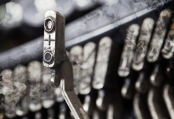 Image showing O hammer - old manual typewriter - mystery smoke