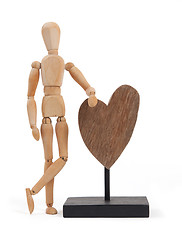 Image showing Wooden mannequin with a big heart