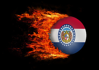 Image showing US state flag with a trail of fire - Missouri