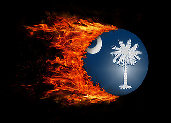 Image showing US state flag with a trail of fire - South Carolina