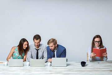 Image showing Business team working on their business project together at office