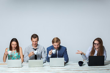 Image showing Business team working on their business project together at office