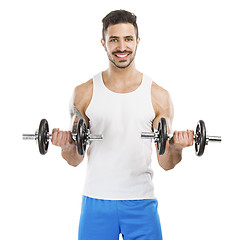 Image showing Athletic man lifting weights