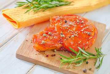 Image showing raw steak with aroma spices