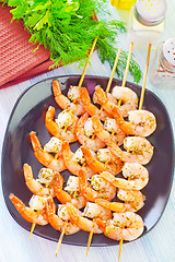 Image showing boiled shrimps are beaded on sticks