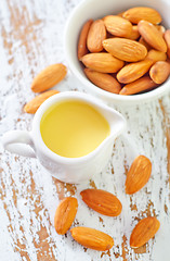 Image showing almond essential oil and almond in bowl