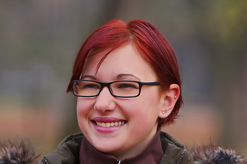 Image showing Smiling redheaded girl
