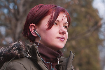 Image showing Listening to music