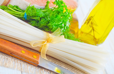 Image showing raw rice noodles and raw salmon