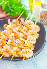 Image showing boiled shrimps are beaded on sticks