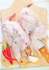 Image showing raw quail