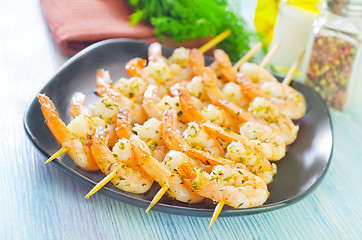 Image showing boiled shrimps are beaded on sticks