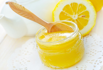 Image showing honey and lemons