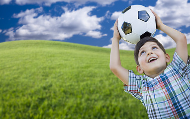 Image showing Cute Boy with Soccer Ball in Park