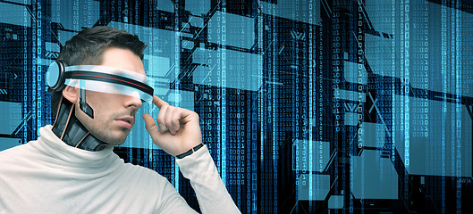 Image showing man with futuristic glasses and sensors