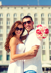 Image showing smiling couple in city