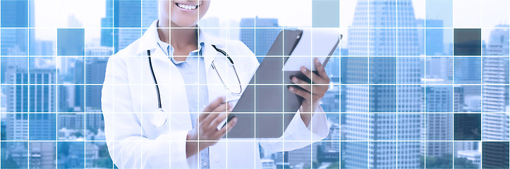 Image showing happy african female doctor with clipboard