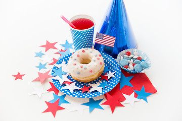 Image showing donut with juice and candies on independence day