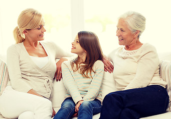 Image showing smiling family at home