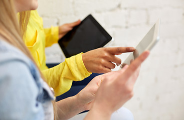 Image showing close up of students with tablet pc at school