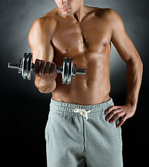 Image showing young man with dumbbell