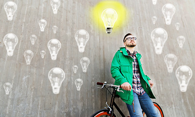 Image showing happy young hipster man with fixed gear bike