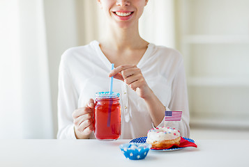 Image showing happy woman celebrating american independence day