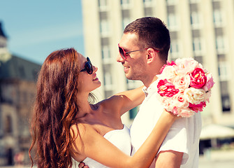 Image showing smiling couple in city