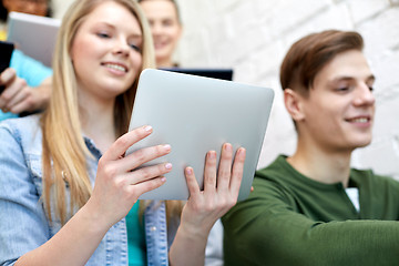 Image showing close up of students with tablet pc at school