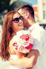 Image showing smiling couple in city