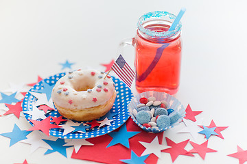 Image showing donut with juice and candies on independence day