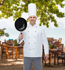 Image showing happy male chef cook holding frying pan