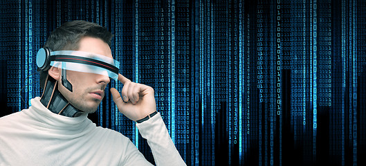 Image showing man with futuristic glasses and sensors