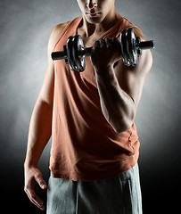 Image showing young man with dumbbell