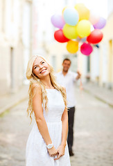 Image showing couple with colorful balloons