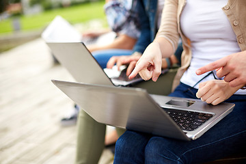 Image showing close up of students or teenagers with laptop