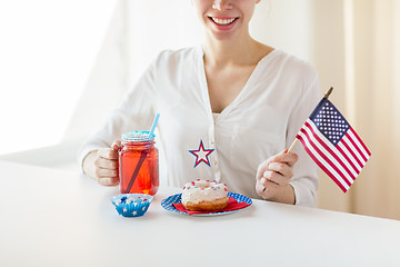 Image showing happy woman celebrating american independence day