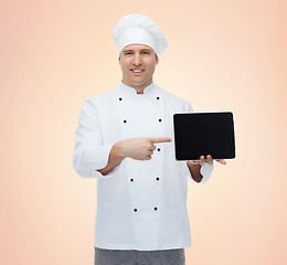 Image showing happy male chef cook showing with tablet pc