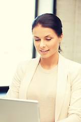 Image showing happy woman with laptop computer