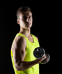 Image showing young man with dumbbell