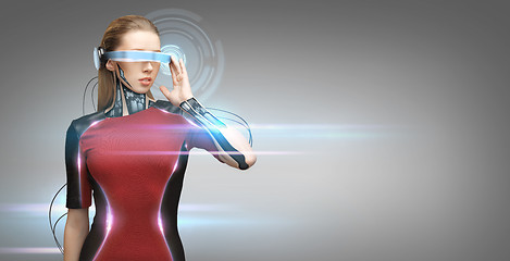 Image showing woman with futuristic glasses and sensors