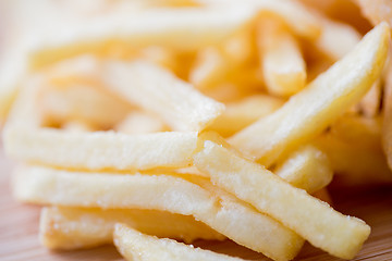 Image showing close up of french fries on table