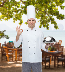 Image showing happy male chef cook with cloche showing ok sign