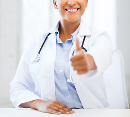 Image showing doctor with stethoscope showing thumbs up