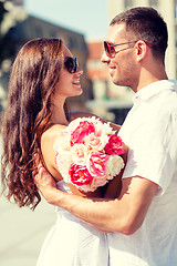 Image showing smiling couple in city