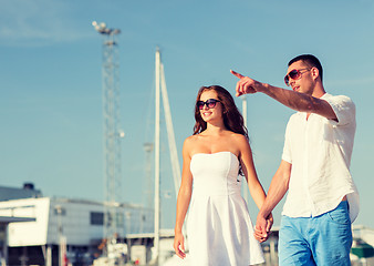 Image showing smiling couple in city