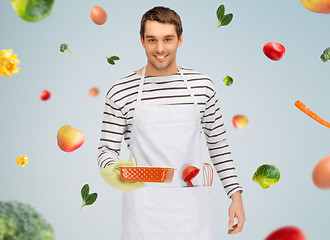 Image showing happy man or cook with baking and kitchenware