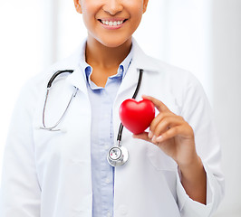 Image showing african doctor with heart