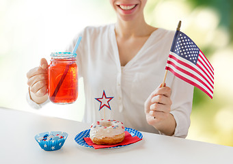Image showing happy woman celebrating american independence day